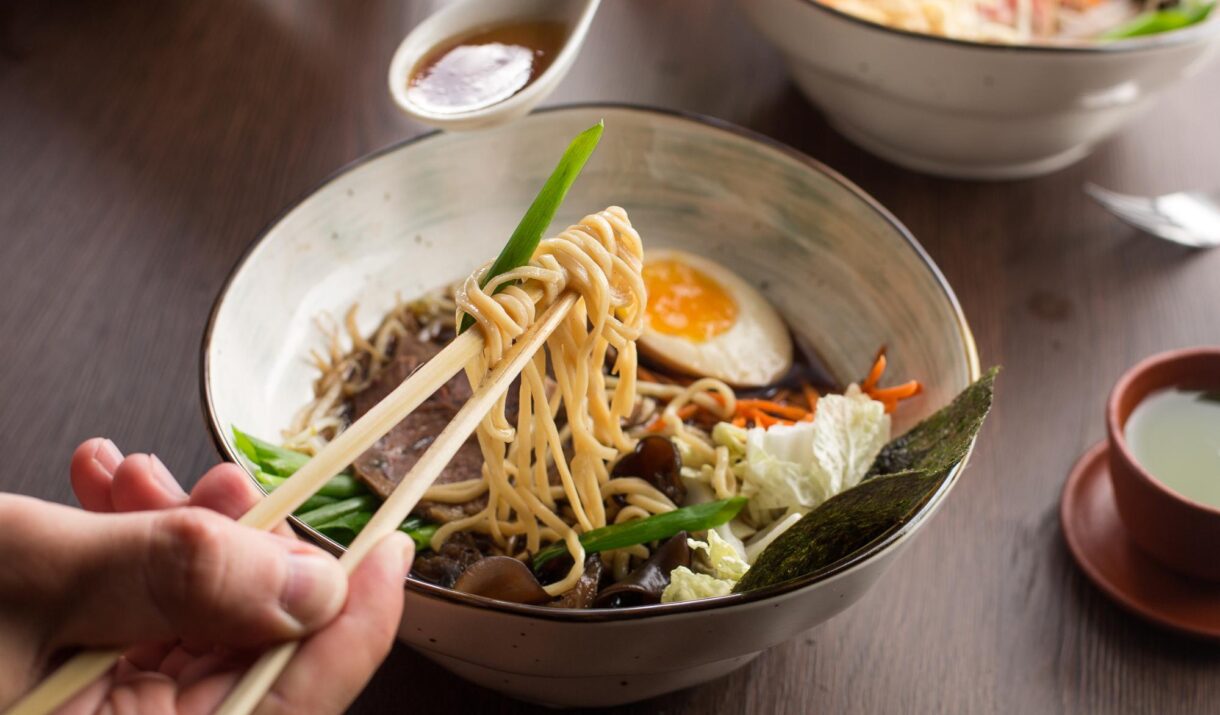 man eating asian ramen with tuna and noodles in a 2023 11 27 05 22 14 utc (1)